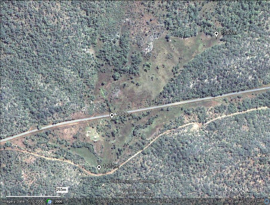 The Nyabutaye Dambo. The former alignment of the Great East Road crossed the Nyabutaye at its outlet from the dambo (at the 1070m altitude marker). The current alignment cuts the dambo roughly in half. The peat bog occupies most of the open terrain to the north of the road, and is flanked by two semi-permanent streams.